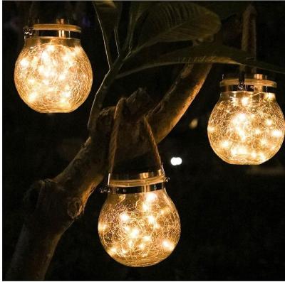 China Custom Hot Sale Decorative Lighting Outdoor Waterproof Hanging Bottle Holiday Jar Garland Solar Slit Glass Lamp For Halloween for sale