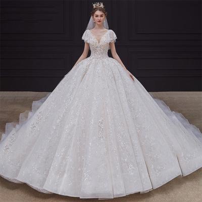 China New Arrival Wedding Dress Elegant Anti-Static V-Neckline Anti-Static Off The Shoulder Heavy Beading Tulle Ball Gown Wedding Dress Bridal for sale