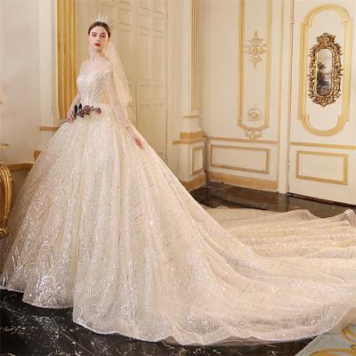 China New Arrival Anti-Static Sequin Wedding Dresses Heavy Ball Gown Long Sleeve Evening Dress With Veil for sale