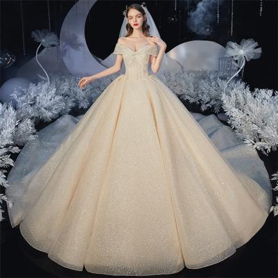 China Latest Designs Anti-Static Anti-Static Off Shoulder Champagne Bridal Gowns Heavy Beading Ball Gown Wedding Dresses With Court Train for sale