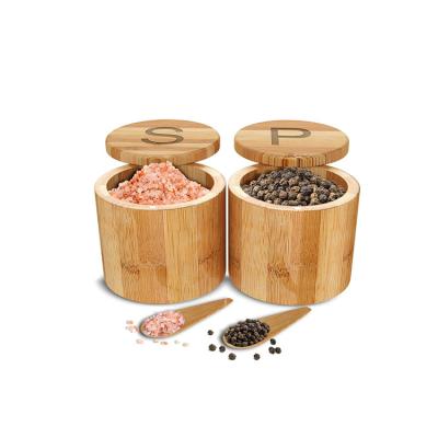 China Custom Logo Round Spices Storage Container Disposable Natural Wooden Spice Jar Organic Bamboo Salt Box With Magnet Swivel Lid for sale