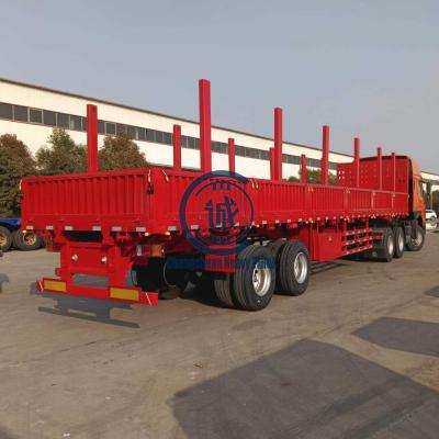 China Brand New Truck Trailer 2 Axle Side Wall Dropside Platform Barrier Semi Trailer Cost Efficient for sale