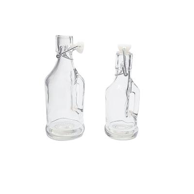 China ECO Eco-friendly Transparent Glass Bottle With Clip Lid High Quality Glass Juice Bottles Seal Tight Juice Bottles With Flange Lid for sale