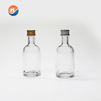 China ECO Screen Printing 50ml Vodka Bottle Small Size Whiskey Glass Bottle Round Empty Liquor Bottle for sale