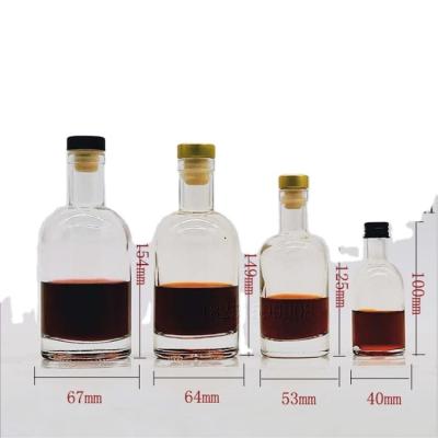 China ECO Screen Printing 50ml 100ml 200ml 250ml Vodka Bottle 750ml Whiskey Glass Bottle Round Empty Liquor Bottle for sale