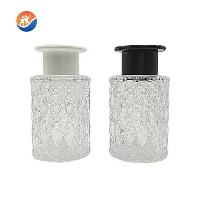 China Fashionable High Quality Small Cylinder Mouth Aromatherapy Bottle Scent Diffuser witn Personality Embossed Lid for sale