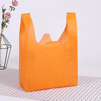 China Personally Wholesale Custom Made Eco Friendly T Shirt W Cut U Cut Shopping Tote Bags Non Woven Vest Tote Bag for sale