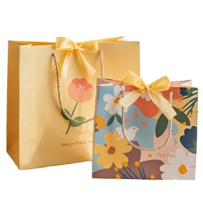 China Custom Your Own Logo Packaging Gift Carry Boutique Shopping Cardboard Paper Bags for sale