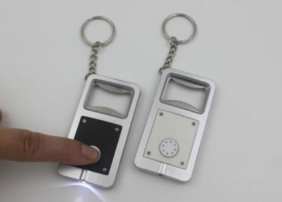 China Keyring automático multifuncional do abridor de garrafa com lanterna elétrica, abridor elétrico do vinho à venda