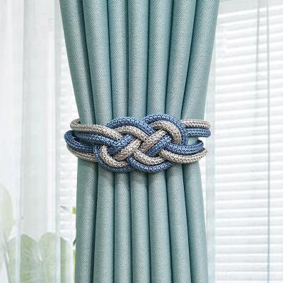 China Traditional Chinese wind two-color auspicious knot buckle curtain magnetic buckle strap spot free drilling free installation curtain buckle for sale