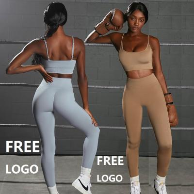 China Breathable Yoga Suit Female Sense Sling Bra Sports Fitness Yoga Pants Solid Seamless Set Women Two Piece Suit for sale