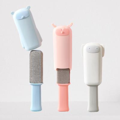 China Cute Sustainable Design Portable Pet Hair Roller Type Remover Clothes Sofa Electrostatic Pet Cat Hair Remover Brush for sale