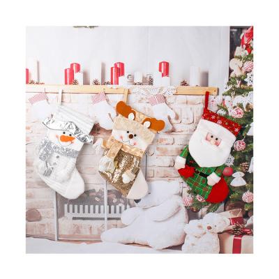 China Cute Christmas Santa Snowman Reindeer Penguin Christmas Decoration Hit Plush Plaid Patterns Christamas KNOCKS Down Gray Christmas Stocking In Bulk for sale