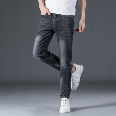 China QUICK DRY Hot new high-elasticity super soft jeans for young men small straight tube all match smoke gray wash jeans for sale