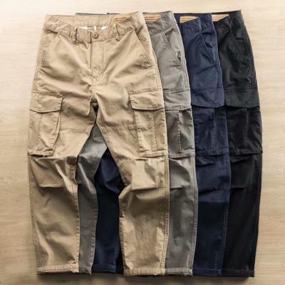 China Anti-wrinkle Best price of China manufacturer streetwear baggy men cargo pants multi pocket Button zipper for sale