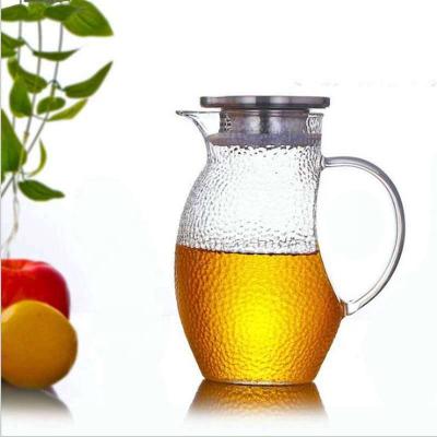 China Pyrex Sustainable Hammer Style Glass Water Heating Pitcher With Stainless Steel Lid for sale