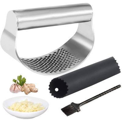 China Amazon viable factory new direct kitchen instruments tools garlic press stainless steel multi-function garlic press for sale