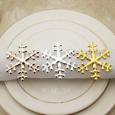 China Minimalist Gold Napkin Loop Cafe Ring Hotel Dining Room Restaurant Christmas Gold Snow Napkin Christmas Table Ornament for sale