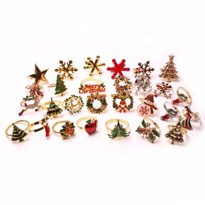 China Viable Luxury Elk Garland Christmas Tree Bell Snowflake Christmas Gold Napkin Towel Rings Hotel Decoration Metal Napkin Holder for sale