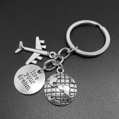 China Promotion Gift Huajing Stainless Steel Alive Your Passport Dream Travel Airplane Key Chain Dream Pilot Pilot Chain for sale