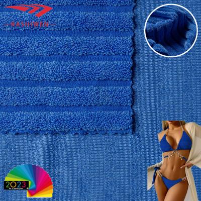 China Free Sample 95% Polyester 5% Spandex Swimwear Knitted Jacquard Fabric Bikini Swimwear Shrink-Resistant Terry Jacquard Fabric Custom Color for sale