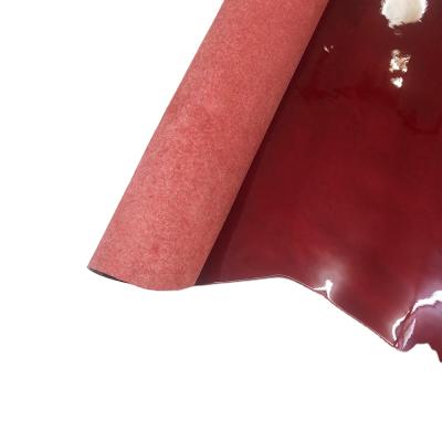 China Viable red patent leather cowhide for making clothes and shorts and shoes for sale