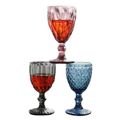 China Colorful Goblets 300ml Embossed Stained Glass Wine Glass Thickened Vintage Tall Wine Glasses for sale