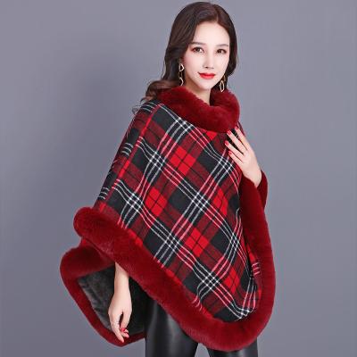 China Anti-Wrinkle Factory Direct Sale Winter Fashion Tartan Plaid Shawls Women Faux Fur Poncho for sale