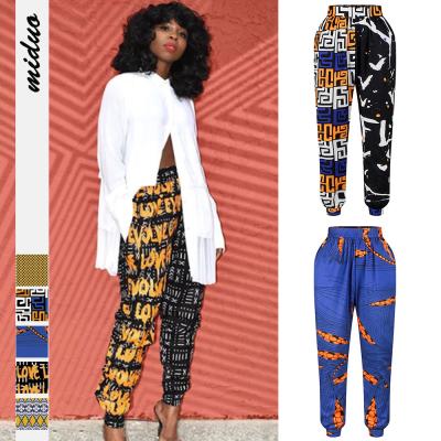 China Anti-wrinkle 2021 autumn clothes for women African print elastic harem pants high waist casual pants for ladies for sale