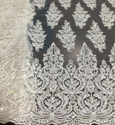 China New Design Shrink-Resistant Heavy Beaded Bridal Lace Fabric Machine Beaded Embroidery Lace Fabric For Wedding Dress Or Party for sale