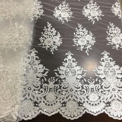 China Shrink-resistant white bridal haute couture beaded lace fabric / heavy machine embroidery beaded wedding lace fabric for dresses for sale