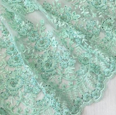 China New Design Green Heavy Handmade Beaded Rhinestones Embroidery Lace Fabric Shrink-resistant Beaded Lace Fabric For Dress for sale