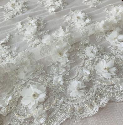 China Shrink-Resistant Bridal 3d Flower Beaded Lace Embroidered Tulle Fabric With Handwork High Quality Wedding Dress Fabric for sale