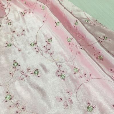 China Top Fashion Machine Embroidery Apparel Tear-resistant Fabric With Beads And Stones Bridal Embroidery Lace Fabric High Quality Satin Fabric for sale