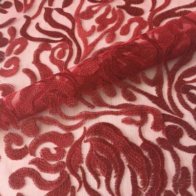 China Shrink-Resistant Fancy Red Machine Plain Embroidery Tulle Fabric All Over Embroidery Designs For Dress Or Apparel for sale