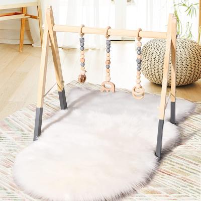 China Eco-Friendly Educational Toy Montessori Crochet Animal Dolls Baby Soft Floors Play Gym Frame Mat with 4 Hanging Gym Rattan Activity Center Toys for sale