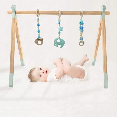 China Eco-Friendly Educational Toy Montessori Activity Wooden Baby Floors Play Floors Gym Rattan Toys Play Mat Hanging Toys For Baby Newborn Gift for sale