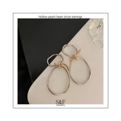 China Wholesale Fashion Knotted Big Gold Plated Jewelry Chunky Hoop Earrings For Women Hyperbole Earrings for sale