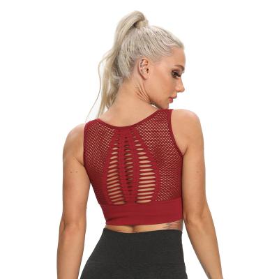 China Sexy Seamless Beautiful Sports Back Fitness Women's Hollow Out Mesh Breathable Yoga Vest for sale