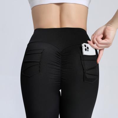 China Breathable women lift hips fitness pants booty crack! crack! sexy with pocket for sale