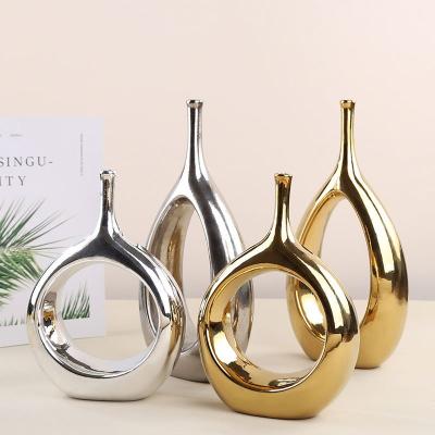 China Modern Nordic Oval Vase Flower Arrangement Silver Plated Modern Gold Vase Porch Living Room Cavity Home Decor Ceramic for sale