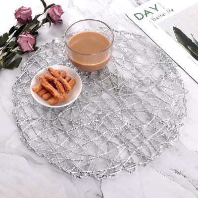 China Wholesale round woven silver woven place mats stocked pvc material place mat table cloth pad fashion decoration for sale