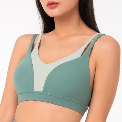 China Fashion Breathable Seamless Sports Style Double Straps Active Yoga Workout Top Bras For Women for sale