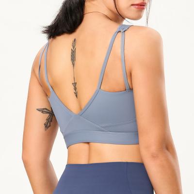 China High Quality Breathable Ladies Yoga Workout Bra Top Stretch Strappy Padded Gym Fitness Sports Bra for sale