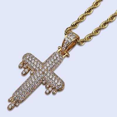 China Religious CZ Diamond Drip Crucifix Pendant Bling Gold Plated Religious Cross Charm Necklace Tiered Drip Ice Out Jewelry for sale