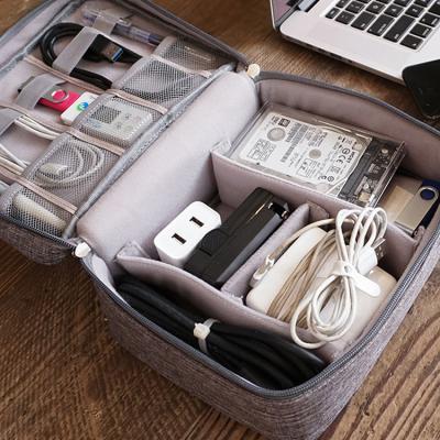 China Fashion Waterproof Canvas Fabric Electronics Accessories Travel Organizer Gadget Bag for sale