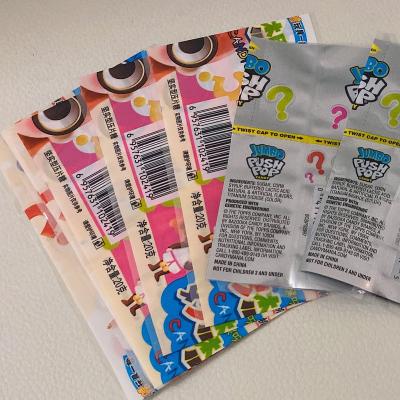 China Custom Printed Sleeve Label Film Moisture Proof PVC/PET/AL Plastic Heat Wrap Shrink For Candy for sale