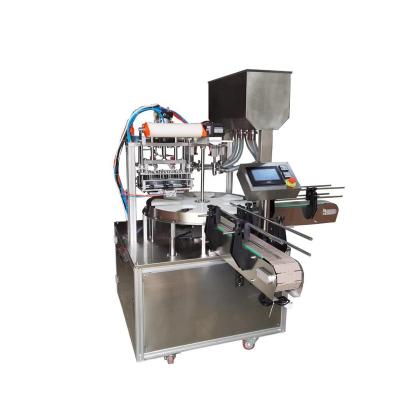 China Tobacco Alcohol Baby Wet Canister Filling Sealing Machine for sale