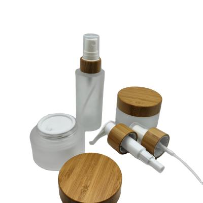 China Hot Selling Products Cosmetic Bottle Cosmetic Bamboo Cream Shampoo Airless Sprayer Mist Pump Lotion Glass Bottle Jar Airless Bottle for sale