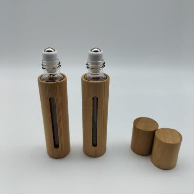 China Yuyao Cosmetic Hot Selling Glass Essential Oil Bottles Roll On Bottle Essential Oil Bamboo Roller Bottles Cosmetic Bamboo for sale